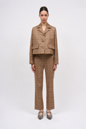 Pantalon fuselé en tweed de laine à carreaux