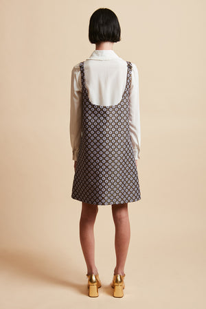 Short pinafore dress in jacquard with floral pattern
