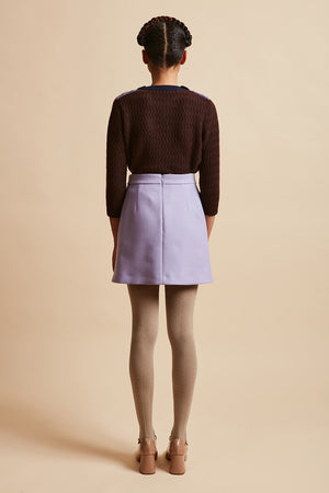 Short skirt worn high waisted