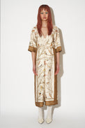 Midi length dress with kimono sleeves tied at the waist with exclusive print