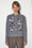 Long sleeve cardigan with intarsia bird pattern in wool