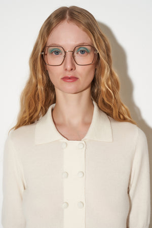 Short-sleeved cashmere cardigan with small covered buttons on the front