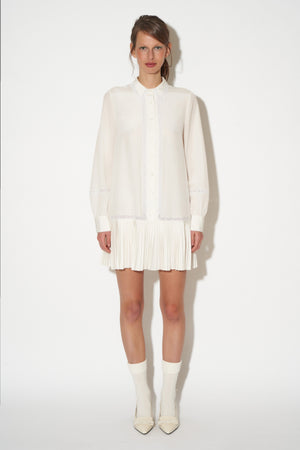 Short blouse dress with pleated silk bottom