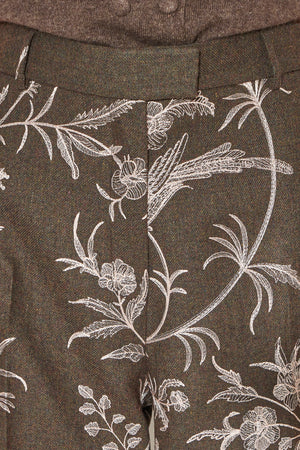 Flannel pants embroidered with floral and bird motifs