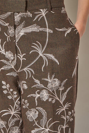 Flannel pants embroidered with floral and bird motifs