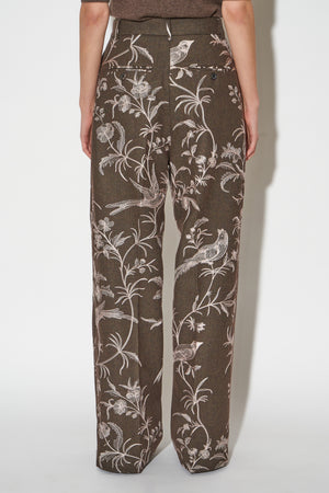 Flannel pants embroidered with floral and bird motifs