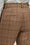 Pantalon fuselé en tweed de laine à carreaux