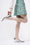 Short skirt entirely hand-embroidered