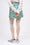 Short skirt entirely hand-embroidered
