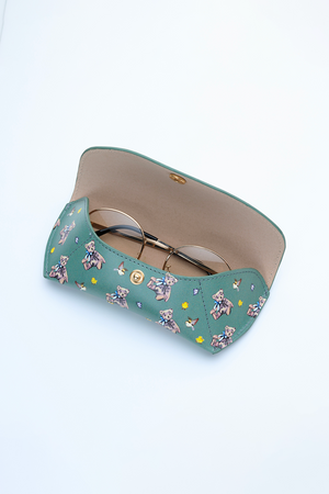 Green glasses case with teddy bear pattern