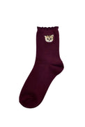 Chaussettes bordeaux motif tête Nounette sur l'ourlet