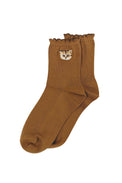 Brown socks with Nounette head pattern on the hem