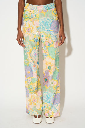 Straight cut pants with floral pattern printed on tulle embroidered with sequins