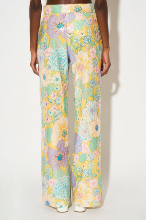 Straight cut pants with floral pattern printed on tulle embroidered with sequins