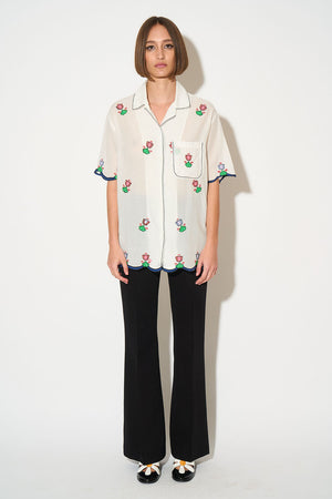 Wide cut shirt embroidered in cotton muslin