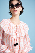 Blouse with large ruffles in cotton voile