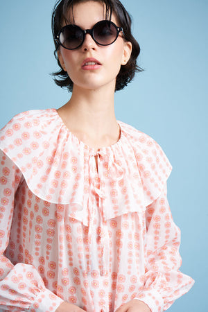 Blouse with large ruffles in cotton voile