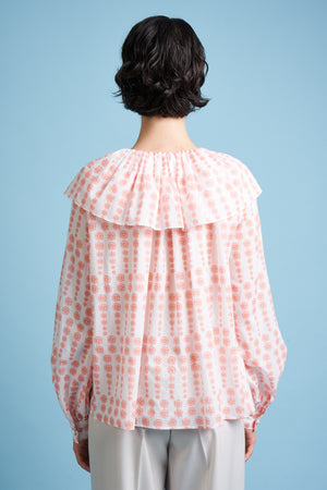 Blouse with large ruffles in cotton voile