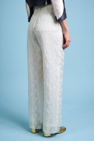 Trousers in cotton and silk organza embroidered with a floral motif