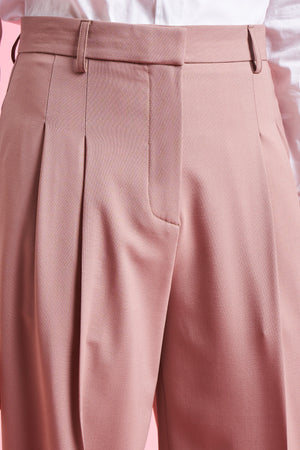 Pantalon ample en laine tropicale d'Italie close up - Rose