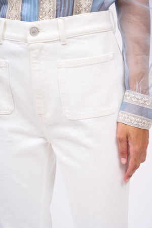 High-waisted flared jeans with patch pockets