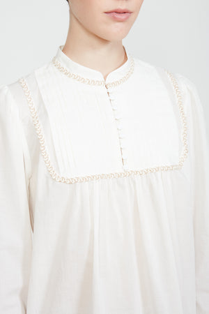 Loose-fit blouse with cotton voile bib