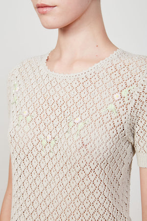 Cotton knit sweater embroidered with floral motifs